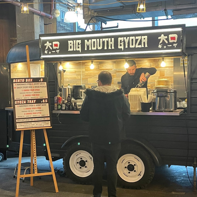 Serving customers from the Big Mouth Gyoza van