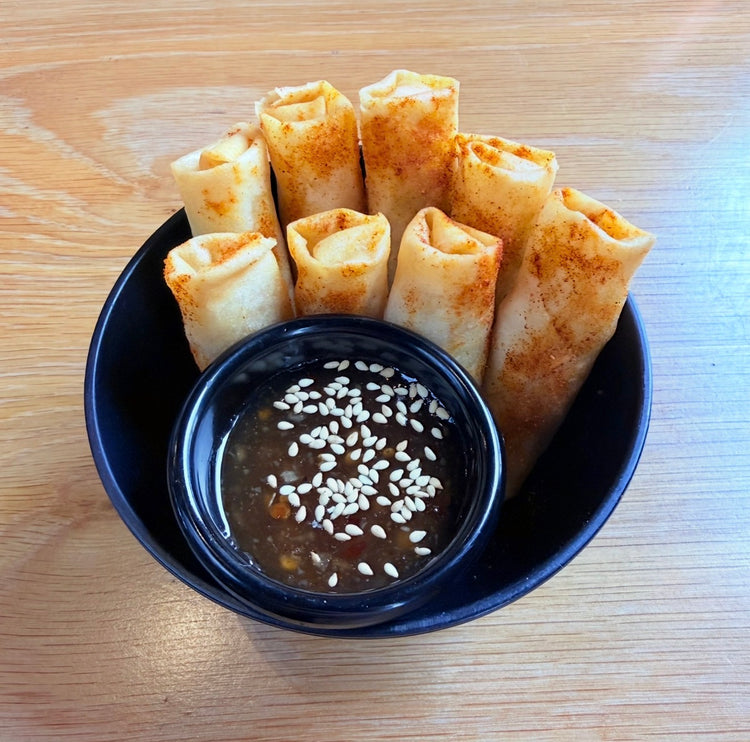 Crispy spring rolls with sesame dipping sauce